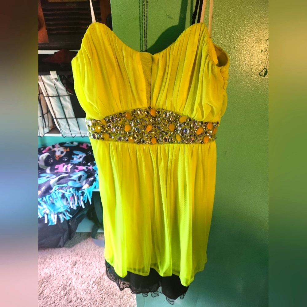 Neon yellow strapless dress with bejeweled waistline